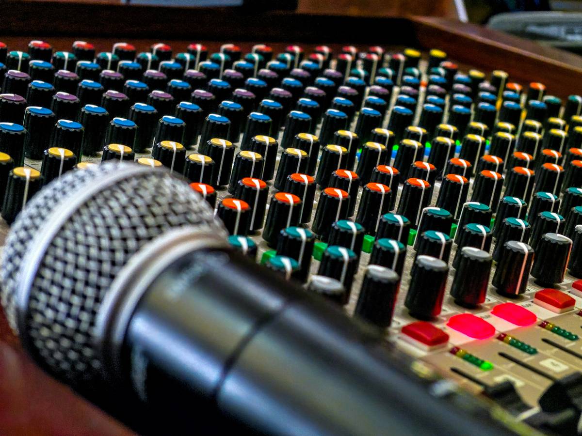 Podcast studio setup showing is a podcast considered media through professional gear and workflow